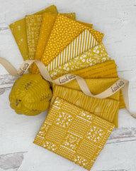 Collection of 10 warm yellow/gold fat quarters 