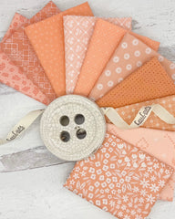 10 fat quarters with peachy backgrounds and a variety of floral, geometric and dot prints. 