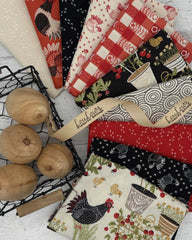 Collection of 10 fat quarters in cream, black and red all with chicken themes. 