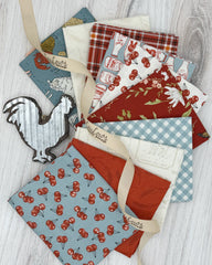 10 country blue, red and cream fabric with a farm feel
