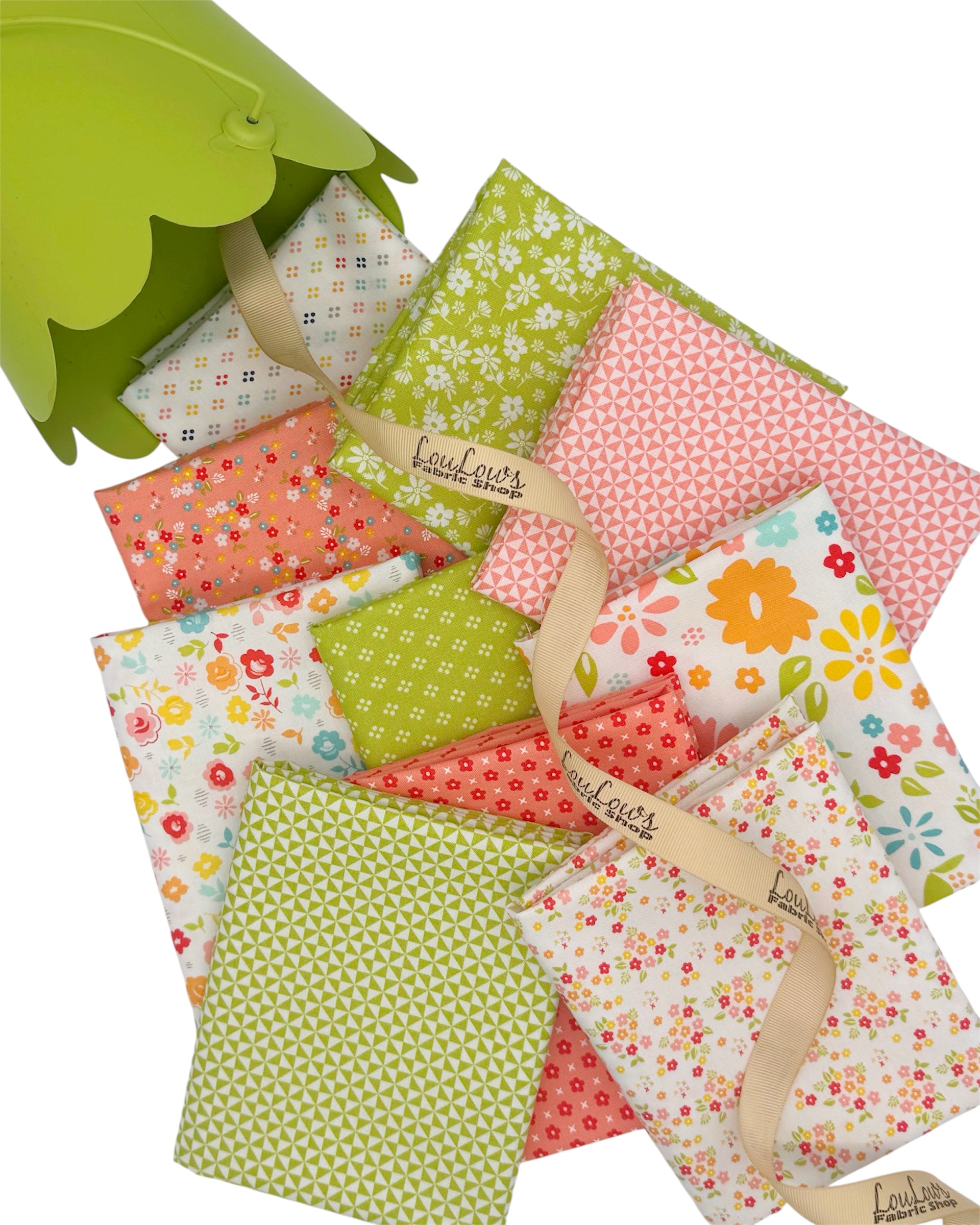 Bright, fun collection of 10 fat quarters in white, green and pink happy florals and geometrics. 