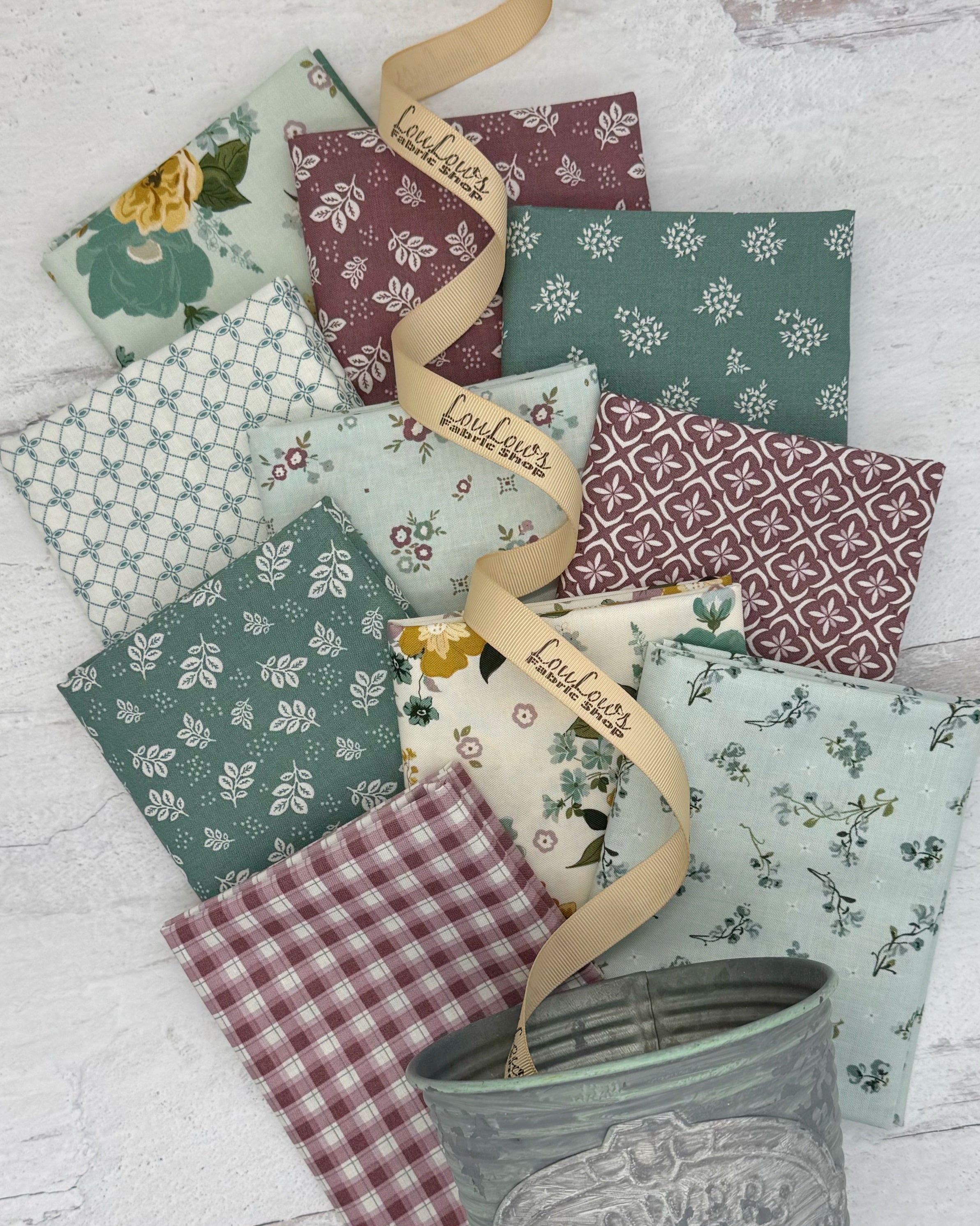 Collection of 10 fat quarters in muted sages and purples with a vintage charm feel. 