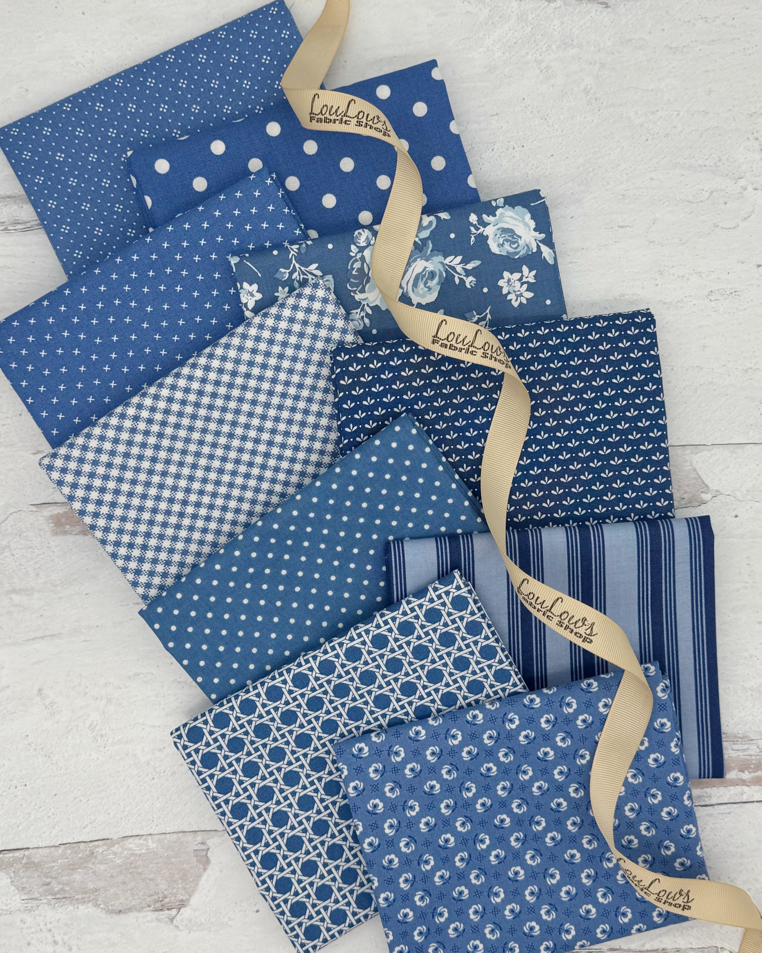 10 fat quarters all in a bright denim color. Florals, ginghams and geometrics. 