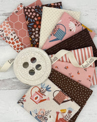 10 fat quarters with cream, dusty pink and chocolate brown backgrounds. Prints have a garden feel. 