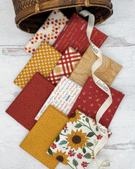 10 fat quarters in off white, rust and golden backgrounds with sunflower, seeds, plaid and fall prints. 