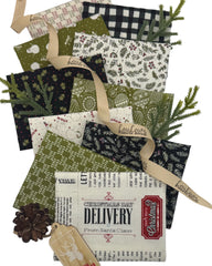 Collection of 10 Christmas themed fat quarters of cream, black and green