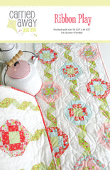 Ribbon Play Table Runner Pattern by Taunja Kelvington of Carried Away Quilting